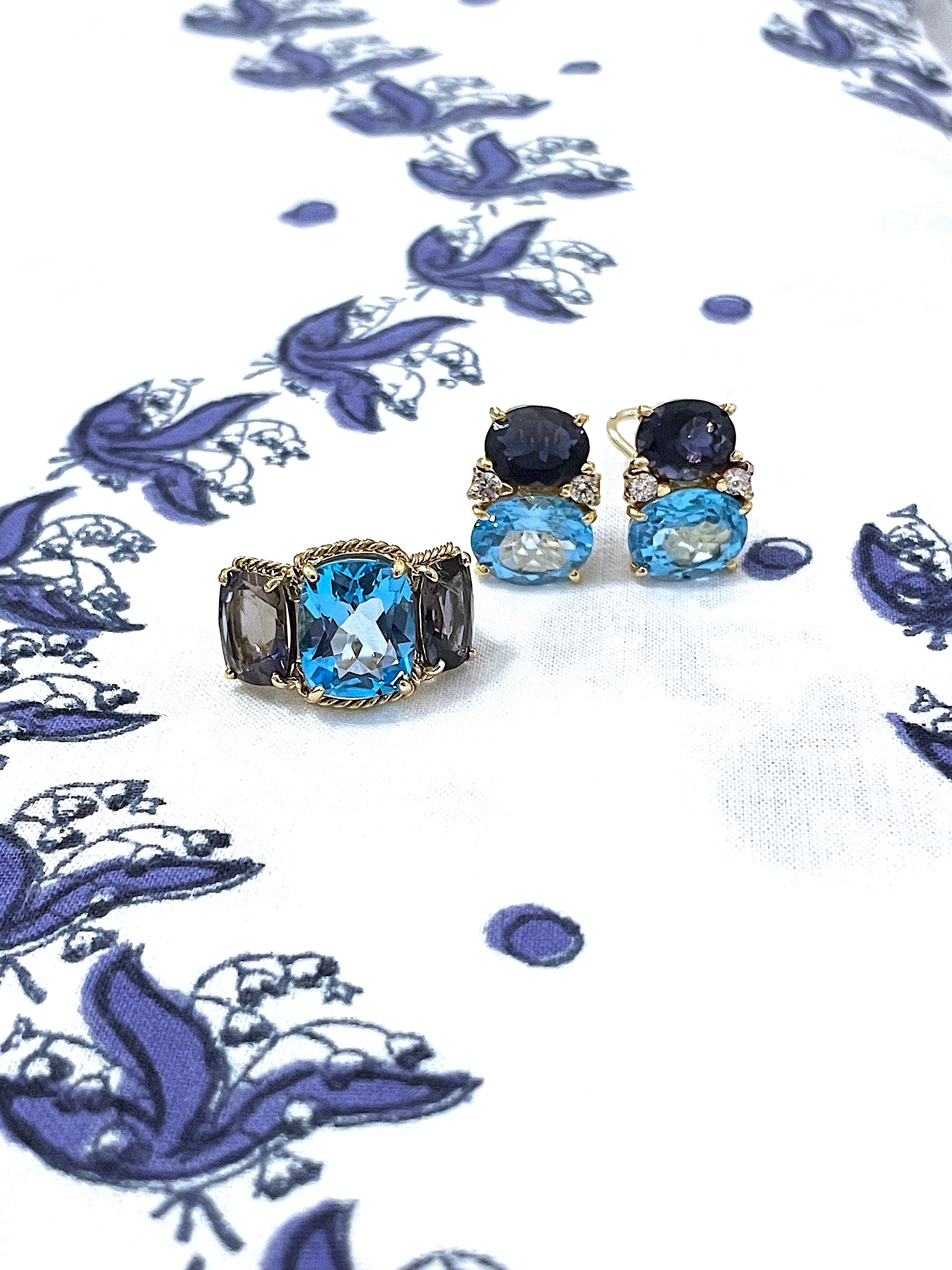 Blue Topaz Three Stone Ring with Twisted Rope Twist Border