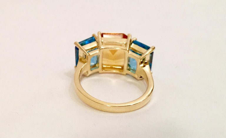 18kt Yellow Gold Mini Emerald Cut Ring with Blue Topaz and Peridot