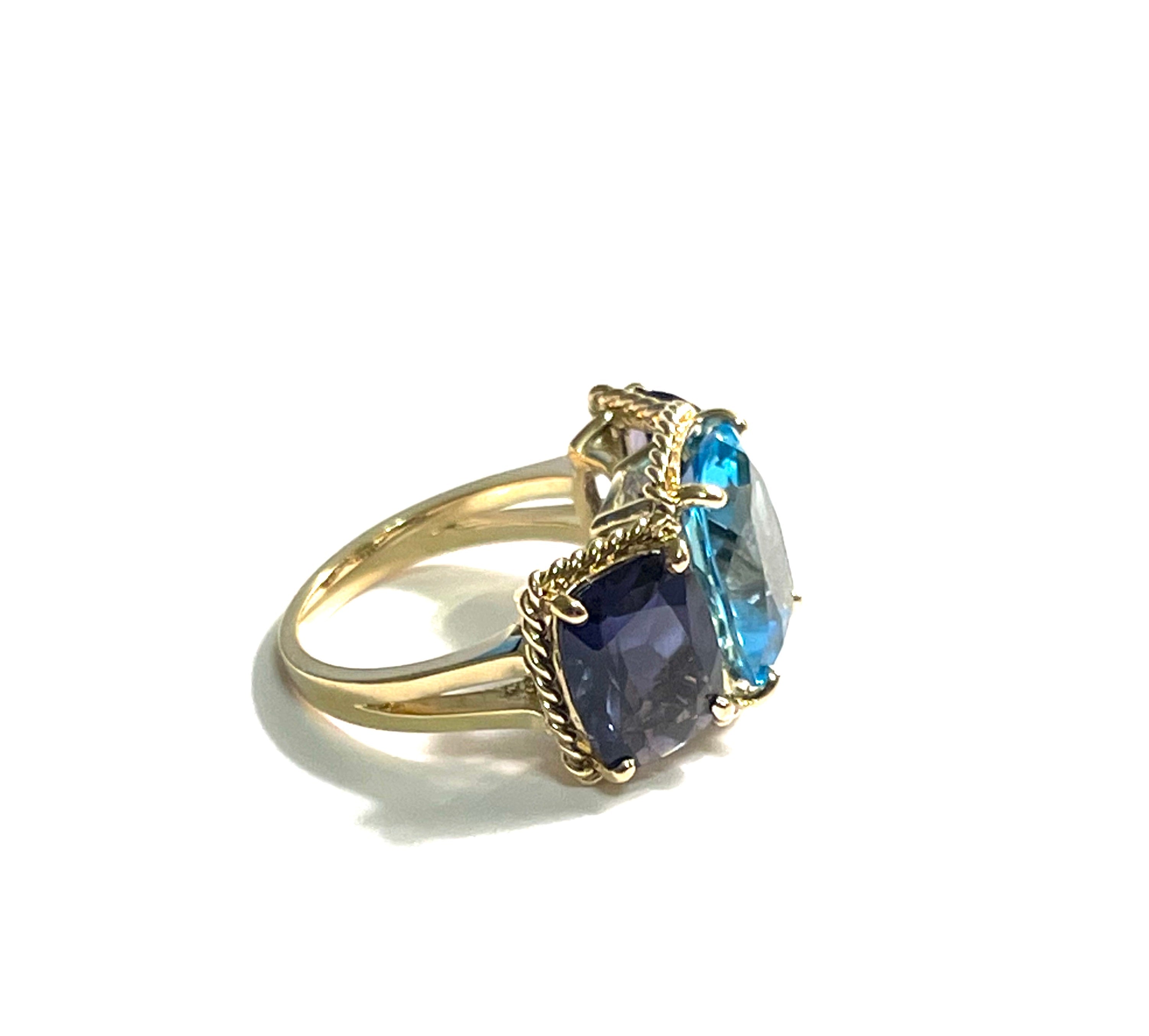 18kt Yellow Gold Three Stone Ring with Pink Topaz and Blue Topaz and Rope Twist Border