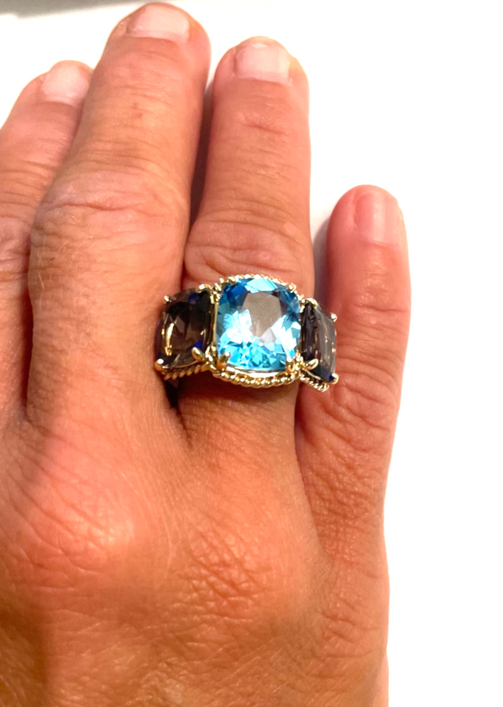 18kt Yellow Gold Three Stone Ring with Pink Topaz and Blue Topaz and Rope Twist Border