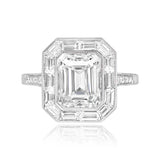 Platinum European cut Diamond and Emerald Halo set Ring