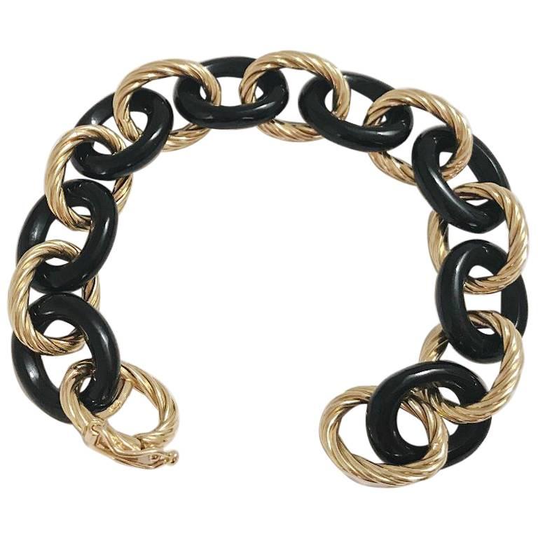 18kt Yellow Gold and Onyx Tassel Ring with Diamonds