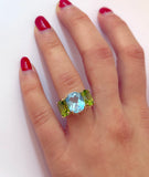 18kt Yellow Gold Sand Dollar Earrings with Peridot and Diamonds