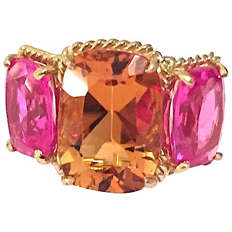 18kt Yellow Gold Three Stone Ring with Pink Topaz and Blue Topaz and Rope Twist Border