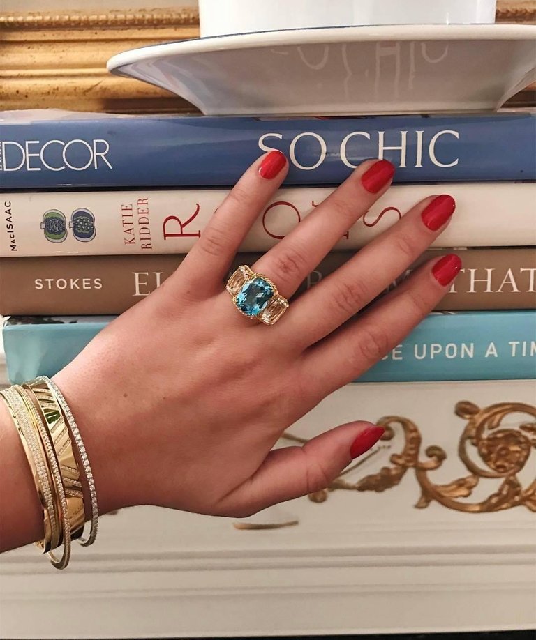 Elegant Three-Stone Ring with Gold Rope Twist Border with Blue Topaz and Peridot