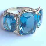 Blue Topaz Three Stone Ring with Twisted Rope Twist Border
