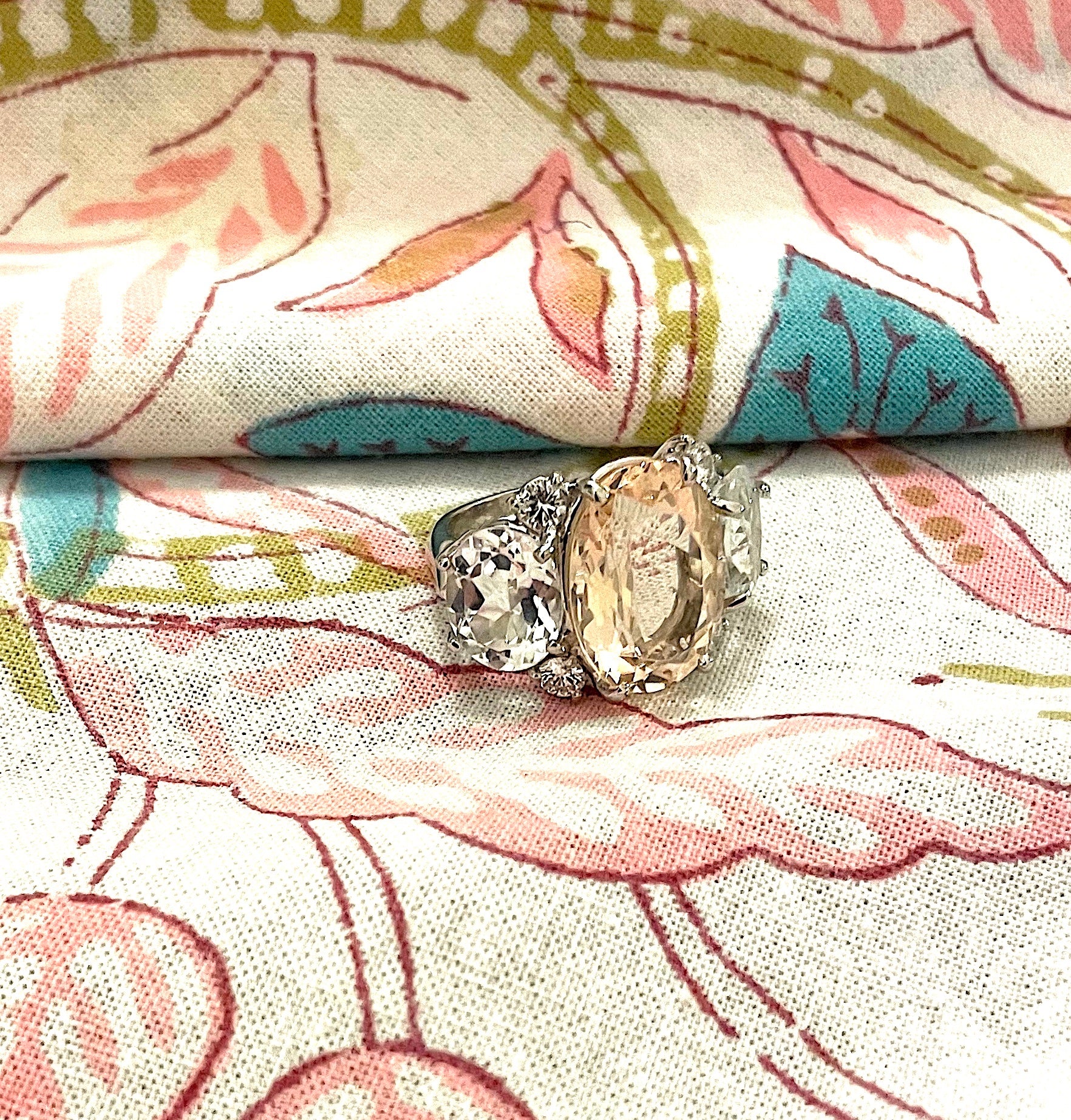 Elegant Three Stone Morganite and Pink Topaz Ring with Gold Rope Twist Border
