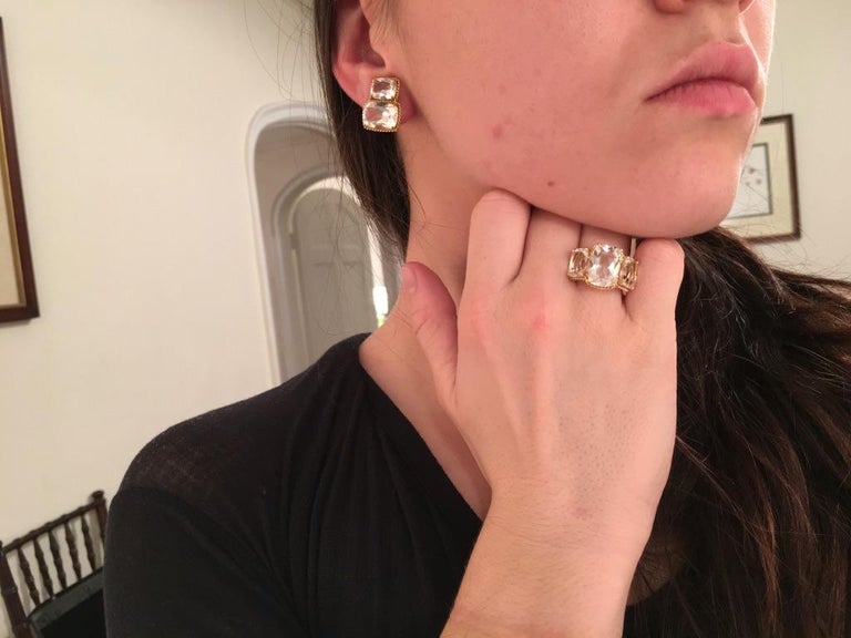 18kt Yellow Gold Three Stone Ring with Pink Topaz and Blue Topaz and Rope Twist Border